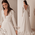 Boho lace wedding dress with long sleeves and deep V-neck