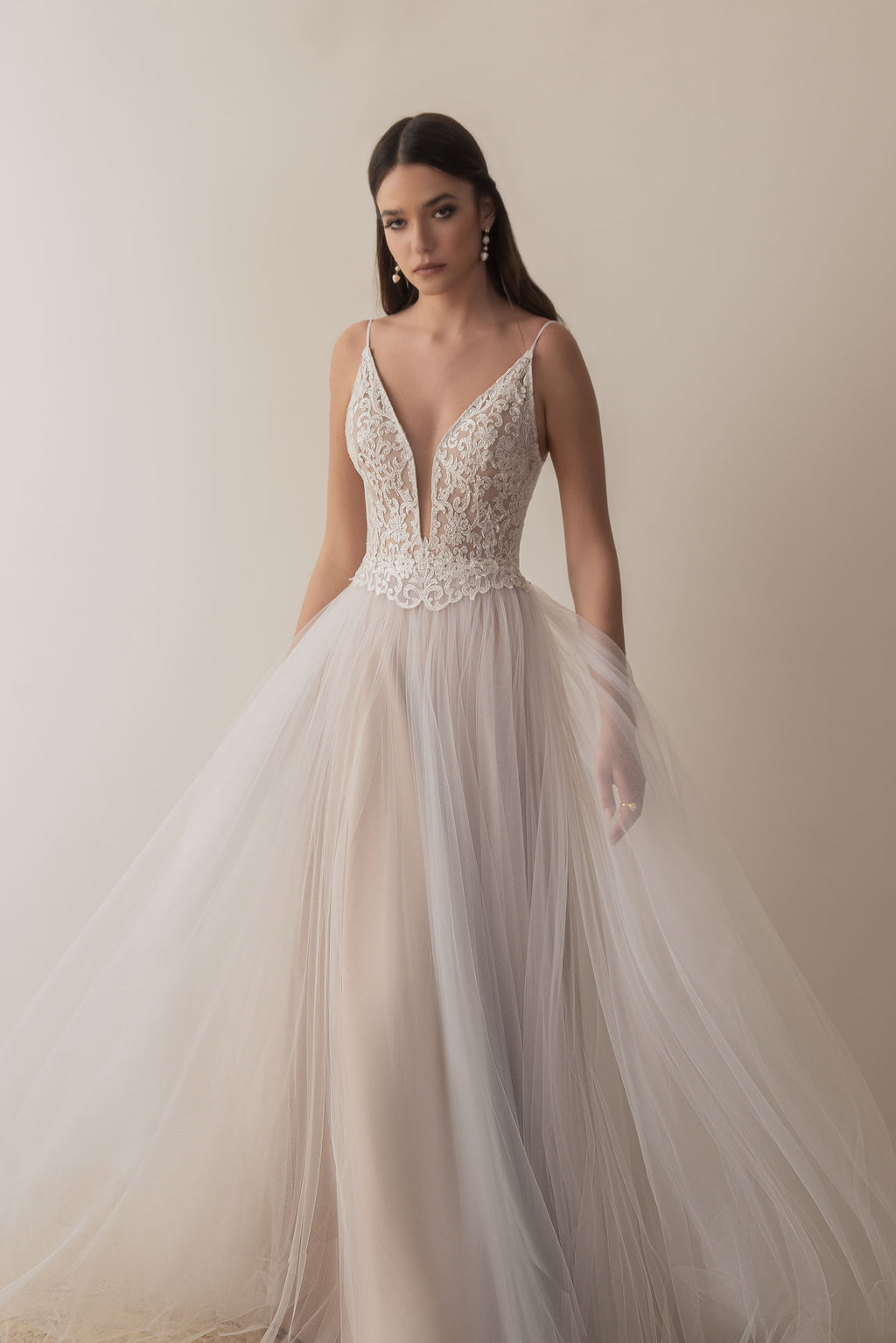 Full front view of a boho bridal gown with lace bodice and tulle skirt