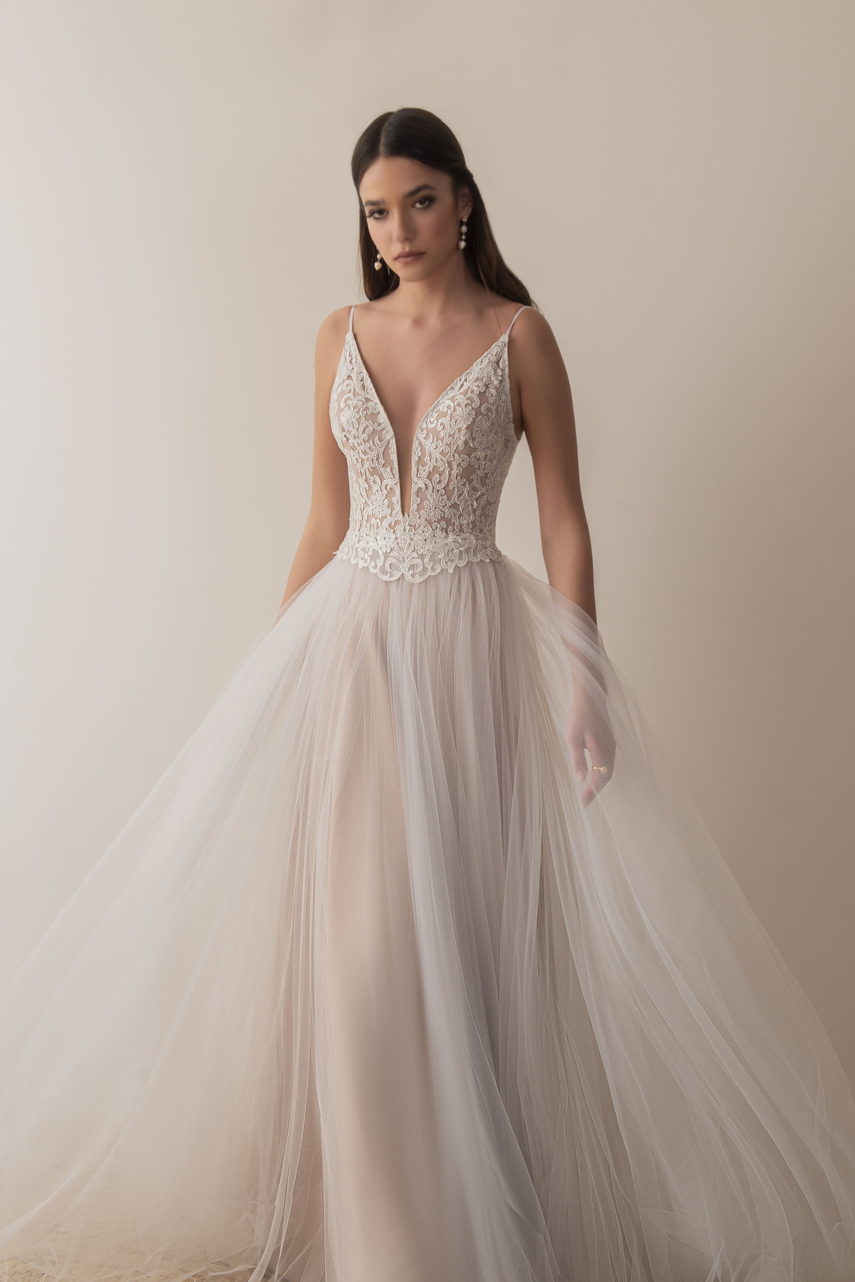 Full front view of a boho bridal gown with lace bodice and tulle skirt