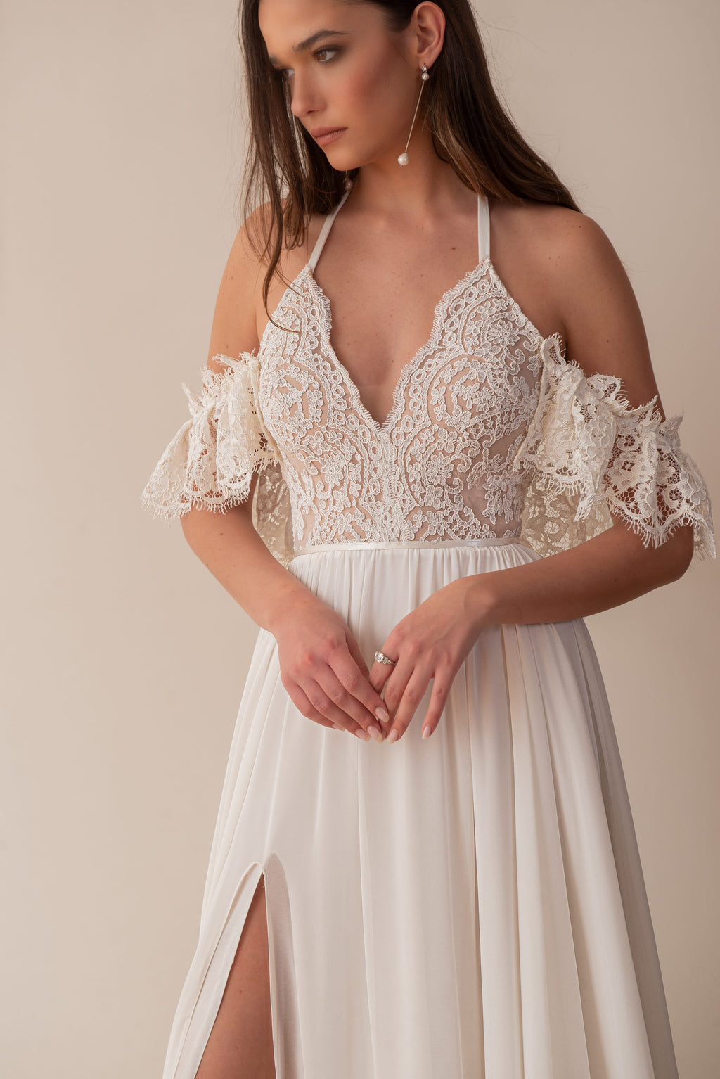 Boho wedding dress with lace corset bodice and soft flowing skirt