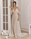 Bride wearing a fitted off-shoulder lace wedding dress