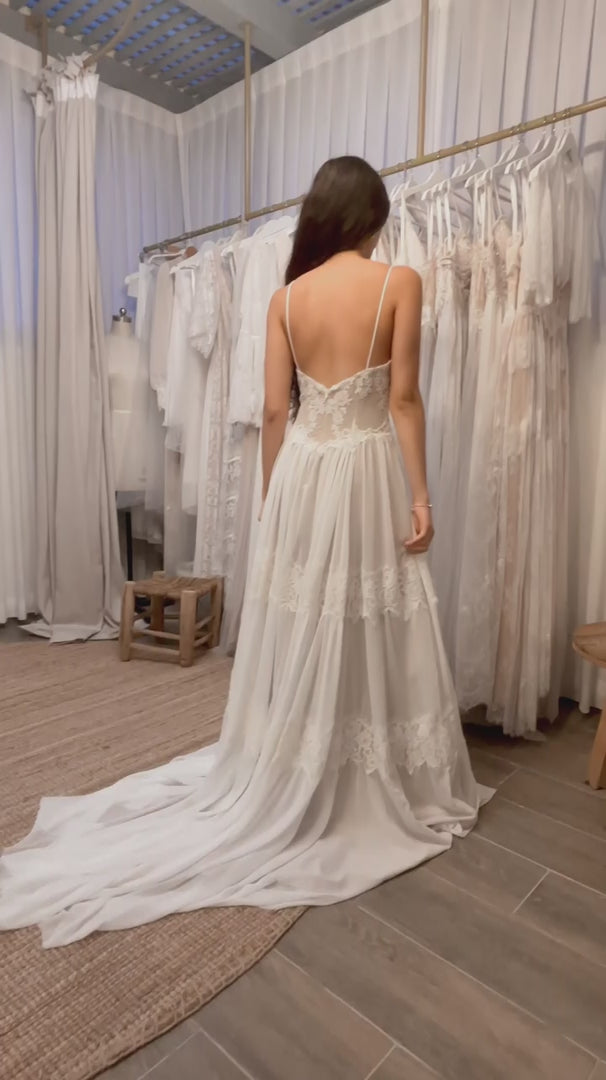 Open-back boho wedding dress with a flowing train, handmade by Shany Sasson | Lace & Love