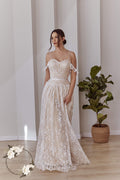 Bride wearing a romantic off-shoulder lace wedding dress