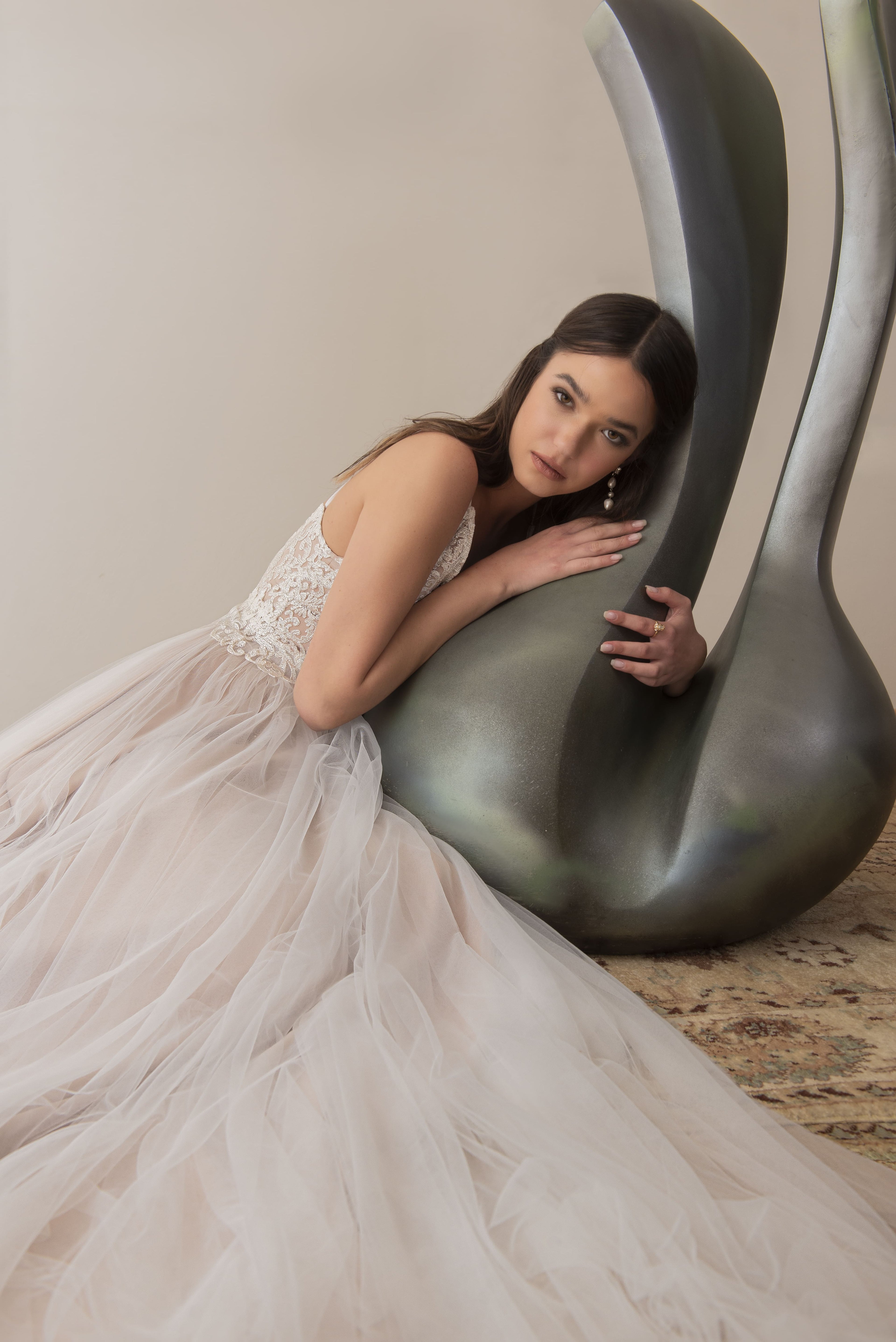 Bride wearing a soft tulle wedding dress with a lace bodice
