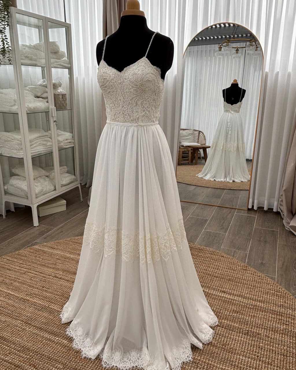 Stella Gown, front view on a dress form