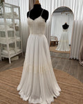 Stella Gown, front view on a dress form