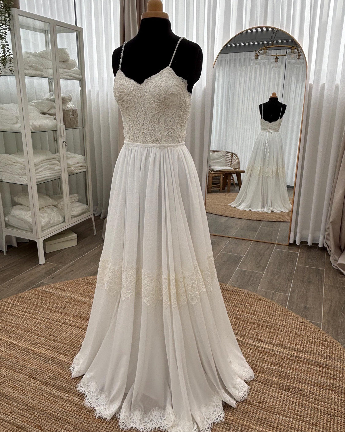 Stella Gown, front view on a dress form